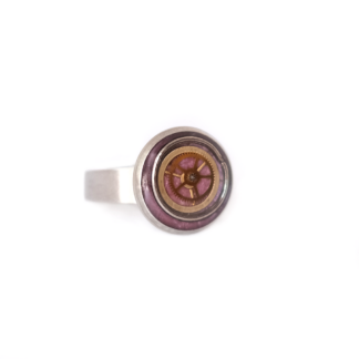 Anillo artesanal purpura y dorado con nucleo mecanico