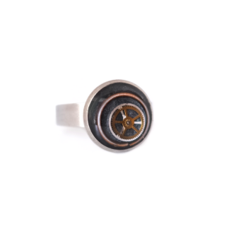 Anillo industrial gris con engranaje cobre